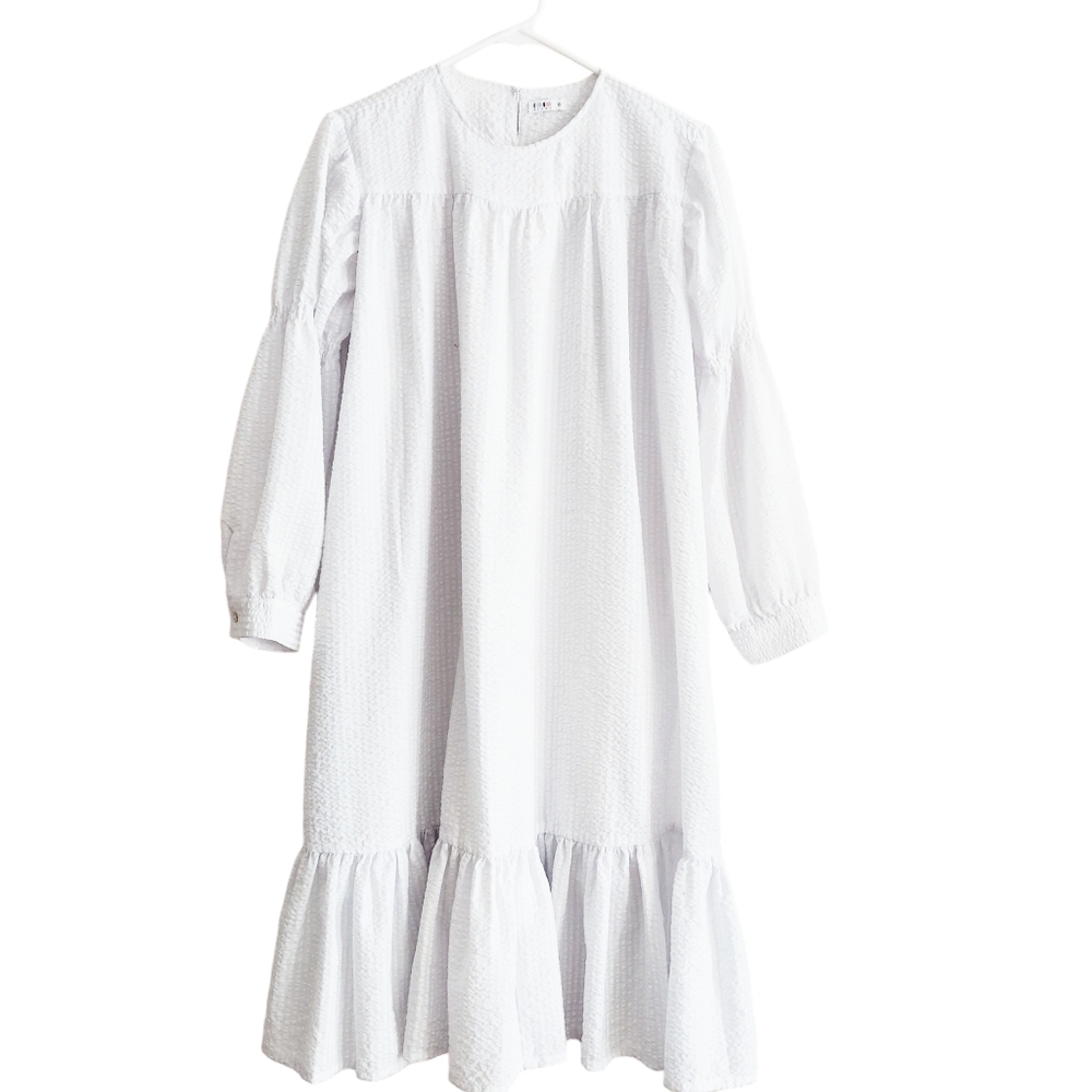Blanc Peplum Hem Dress